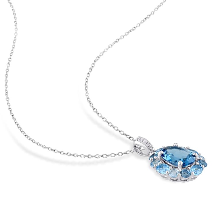5 1/3 CT TGW London, Swiss, Sky Blue and White Topaz Floral Pendant with
Chain in Sterling Silver