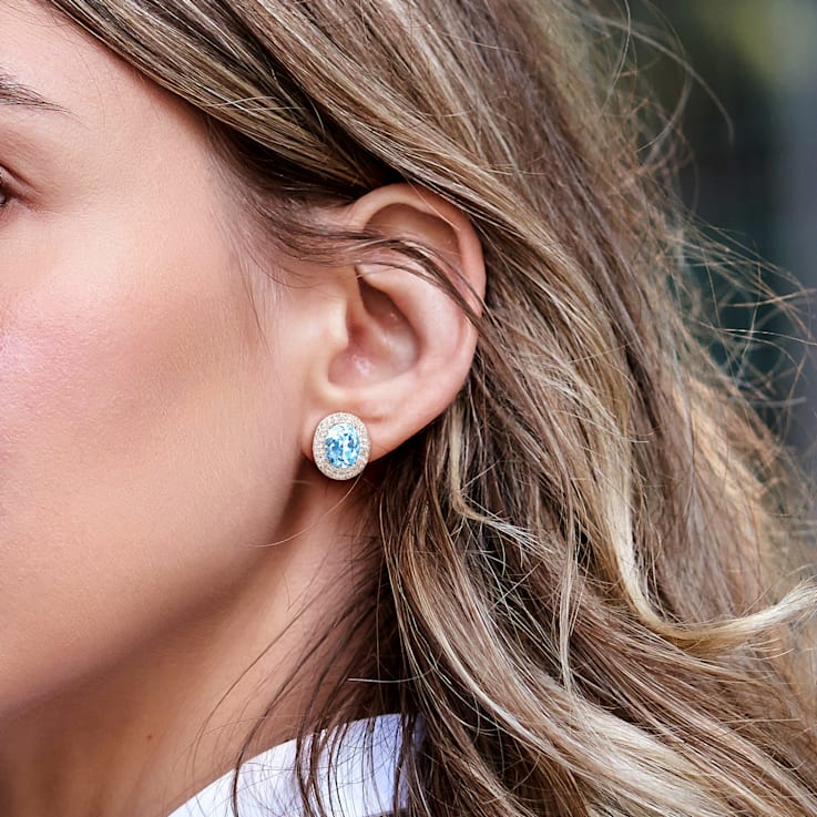 8 5/8 CT TGW Sky Blue Topaz and White Topaz Double Halo Earrings in
Sterling Silver