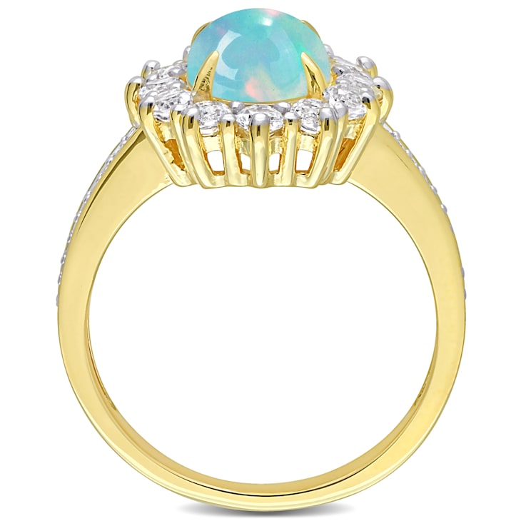 2 1/6 CT TGW Blue Ethiopian Opal, White Topaz and Diamond Ring in Yellow
Plated Sterling Silver