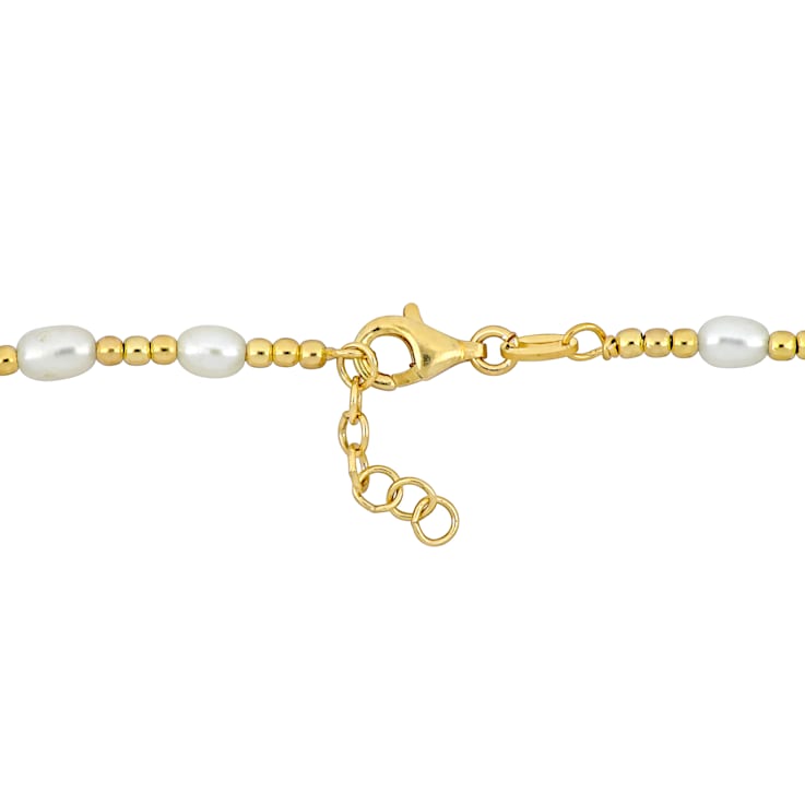 3.5-5MM Freshwater Cultured Pearl Station Bead Bracelet in Yellow Plated
Sterling Silver