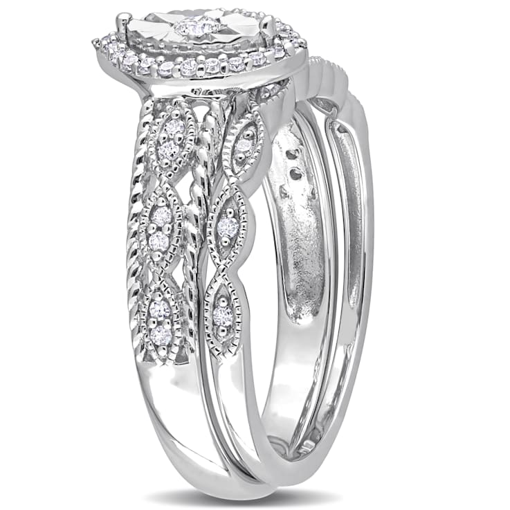 1/5 CT TW Diamond Oval Halo Bridal Ring Set in Sterling Silver