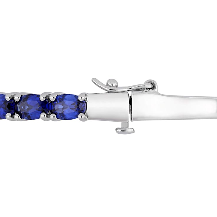 8-1/4 CT TGW Oval-Cut Created Blue Sapphire Bangle in Sterling Silver