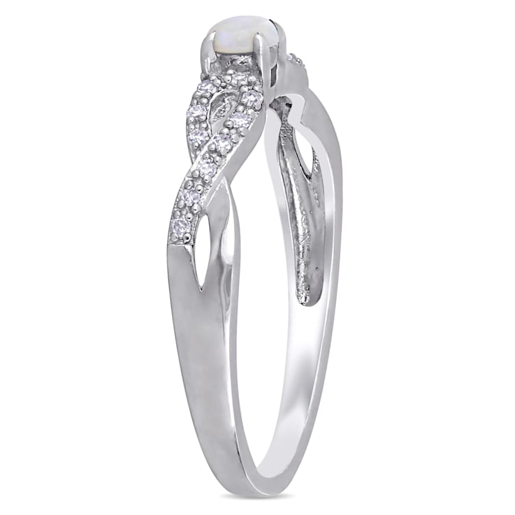 1/10 CT TGW Opal and Diamond Accent Infinity Ring in Sterling Silver