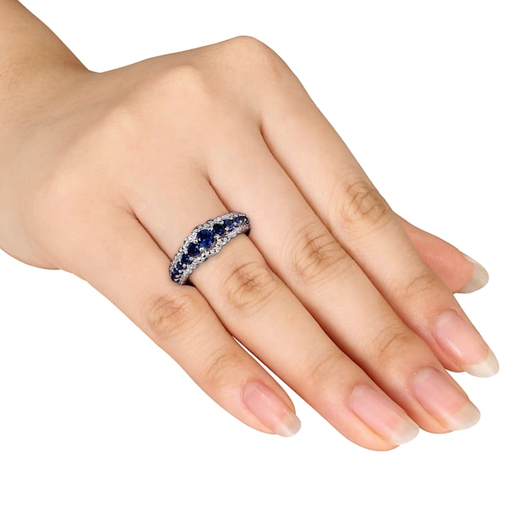 1 1/6 CT TGW Created Blue Sapphire Graduated Ring in Sterling Silver