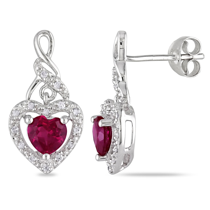 1 1/6 CT TGW Created Ruby and 1/8 CT TW Diamond Heart Twist Earrings in
Sterling Silver
