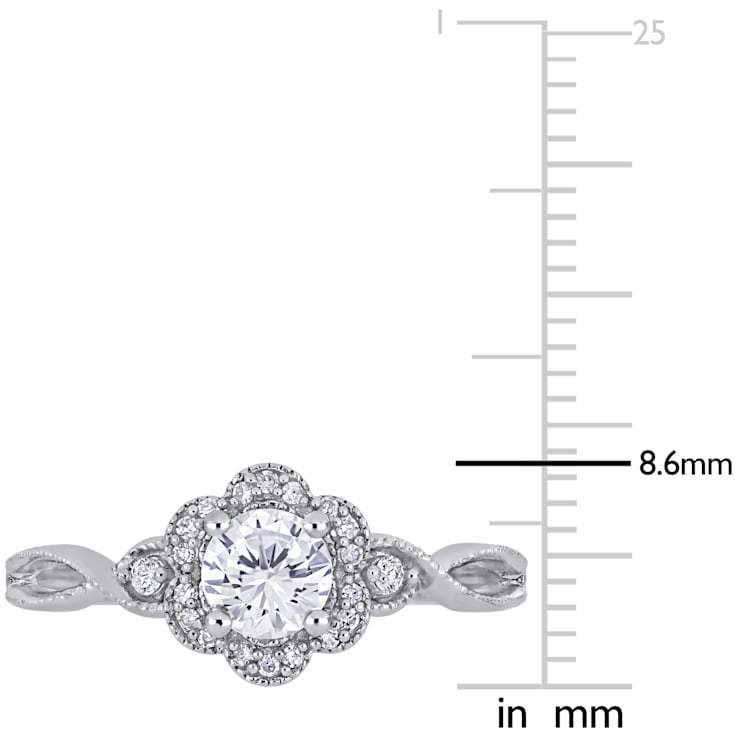 5/8 CT TGW Created White Sapphire and 1/10 CT TW Diamond Vintage Floral
Ring in Sterling Silver