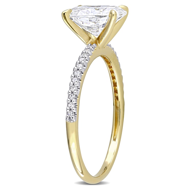 2 CT DEW Created Moissanite and 1/10 CT TW Diamond Engagement Ring in
14K Yellow Gold
