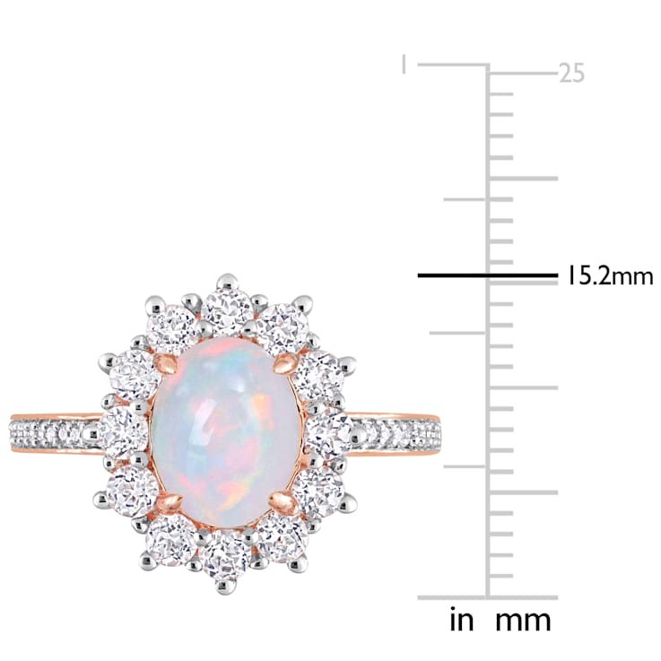 2 1/6 CT TGW Blue Ethiopian Opal, White Topaz and Diamond Accent Ring in
Rose Plated Sterling Silver