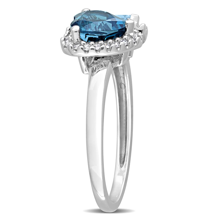 2 1/5 CT TGW London Blue Topaz, Sky Blue Topaz with 1/5 CT TW Diamond
Ring in 14K White Gold