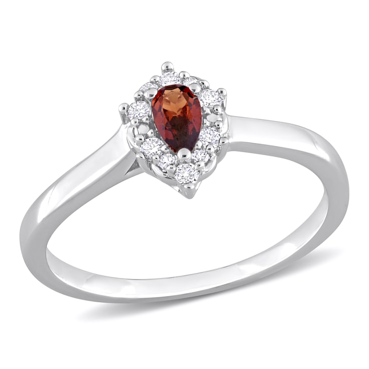 1/4 CTW Garnet and 1/10 CT TW Diamond Halo Ring in Sterling Silver