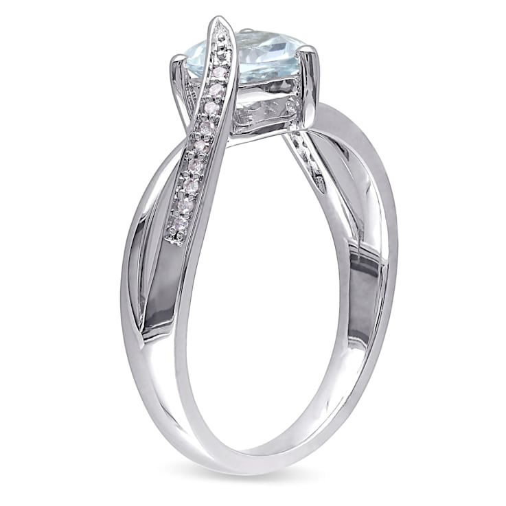 1 1/2 CT TGW Aquamarine and Diamond Accent Heart Crossover Ring in
Sterling Silver