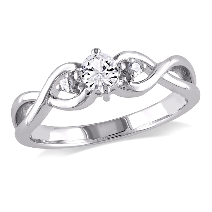 1/3 CT TGW Created White Sapphire and Diamond Accent Infinity Ring in
Sterling Silver