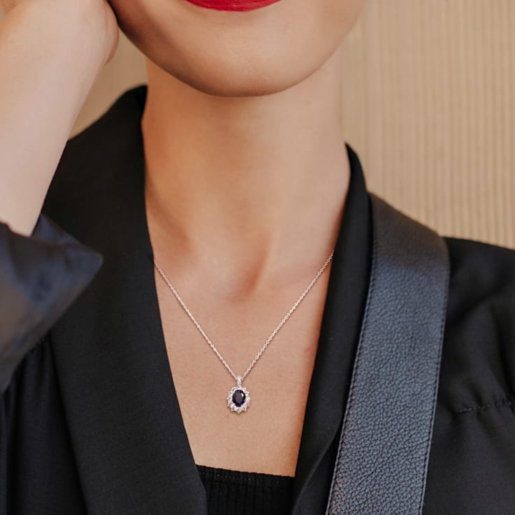 4 CT TGW Created Blues, White Sapphire and Diamond Accent Pendant with
Chain in Sterling Silver