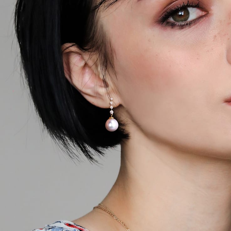 10-10.5MM South Sea Cultured Pearl and 1/6 CT TW Diamond Dangle Earrings
in 14K Yellow Gold
