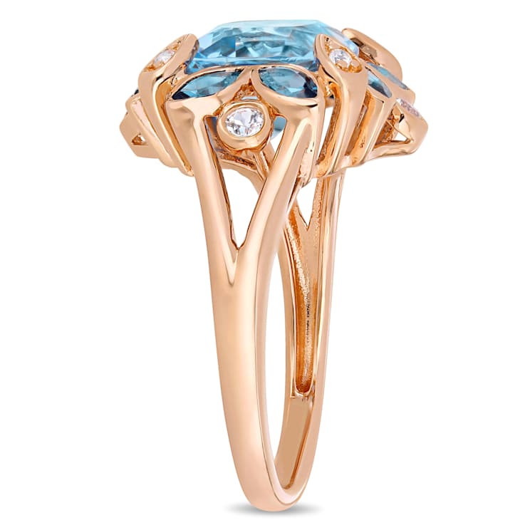 4 4/5 CT TGW London Blue, Sky Blue Topaz with White Topaz Floral Ring in
Rose Plated Sterling Silver