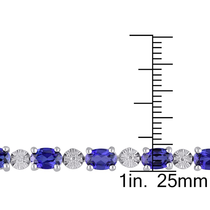 9 7/8 CT TGW Created Blue Sapphire and Diamond Accent Bracelet in
Sterling Silver