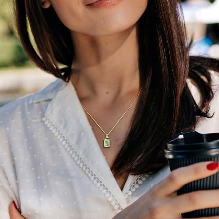 5 5/8 CT TGW Green Quartz and Black Sapphire Pendant with Chain in
Yellow Plated Sterling Silver