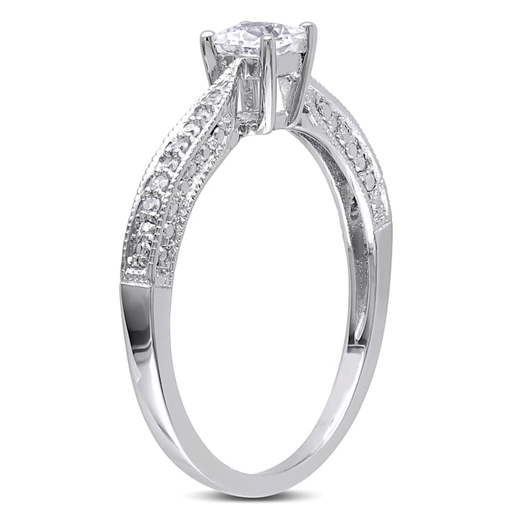 1/3 CT TGW Created White Sapphire and Diamond Accent Engagement Ring in
Sterling Silver