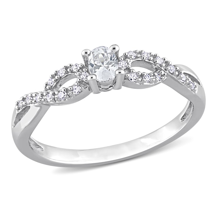 1/4 CT TGW Created White Sapphire and 1/10 CT TW Diamond Infinity
Engagement Ring in Sterling Silver