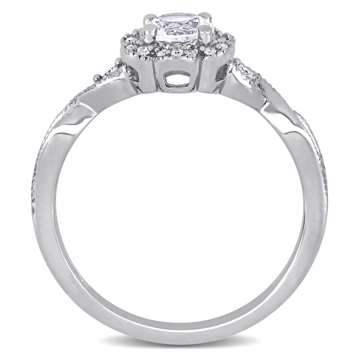 5/8 CT TGW Created White Sapphire and 1/10 CT TW Diamond Vintage Floral
Ring in Sterling Silver