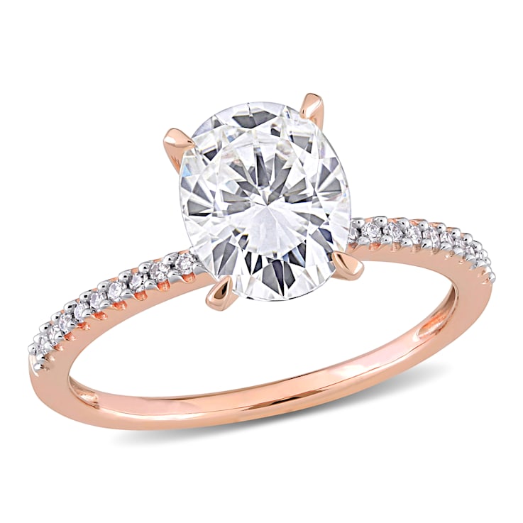 2 CT DEW Created Moissanite and 1/10 CT TW Diamond Engagement Ring in
14K Rose Gold