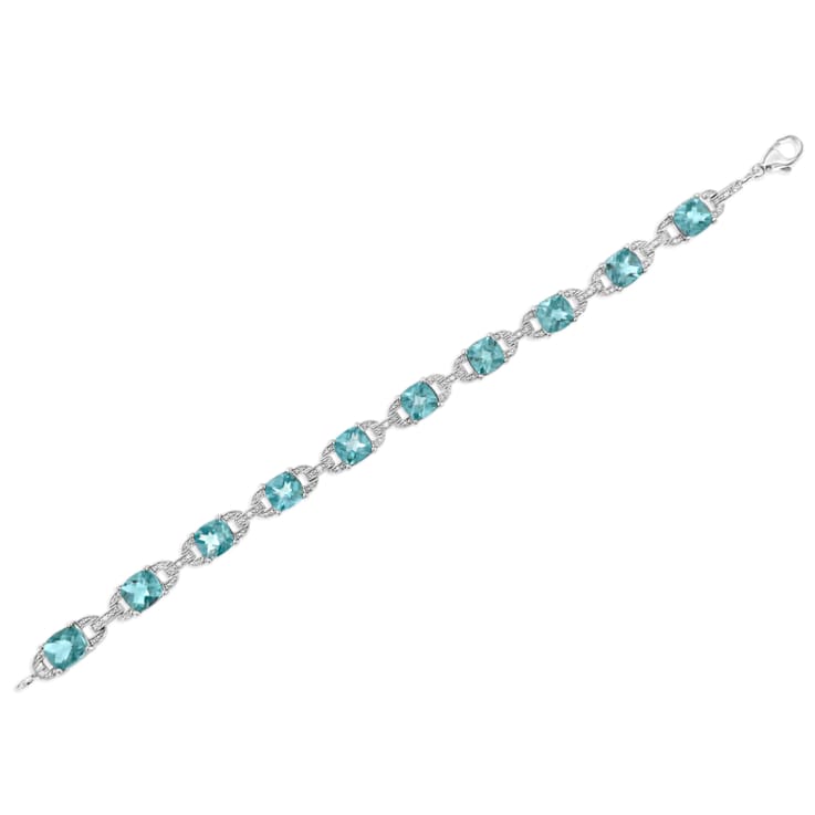 .925 Sterling Silver 7x7 mm Cushion Cut Blue Topaz and 1/20ctw Round Cut
Diamond Tennis Bracelet