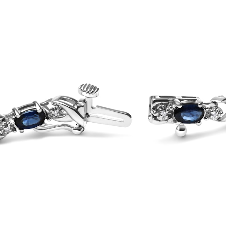 10K White Gold Oval Sapphire Gemstone and 1/10ctw Diamond Prong Set
"X" Link Bracelet - Size 7"