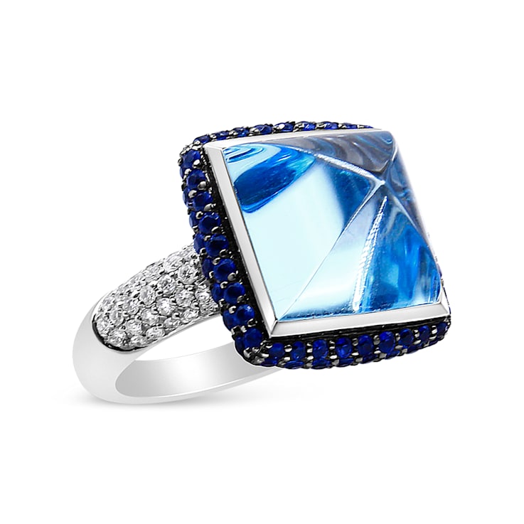 18K White Gold and 12mm Blue Topaz Cocktail Ring with Blue Sapphire Halo
and Pave Diamond Shank Ring