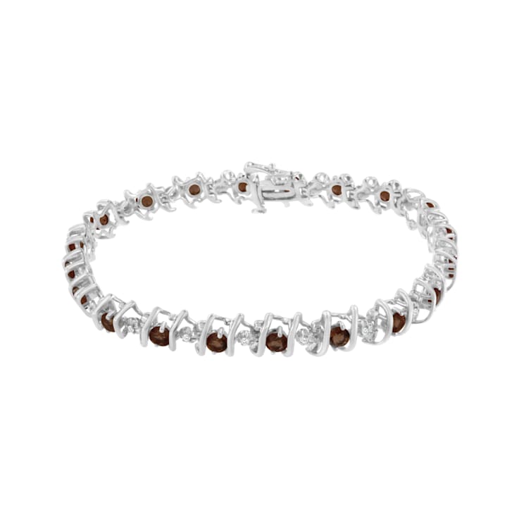 3.5 mm Lab Created Red Garnet and 1/6 ctw Diamond Rhodium Over Sterling
Silver Tennis Bracelet