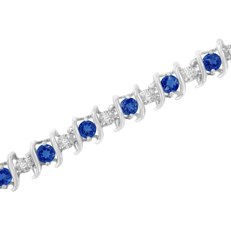 3.5 mm Lab Created Blue Sapphire and 1/6 ctw Diamond Rhodium Over
Sterling Silver Tennis Bracelet
