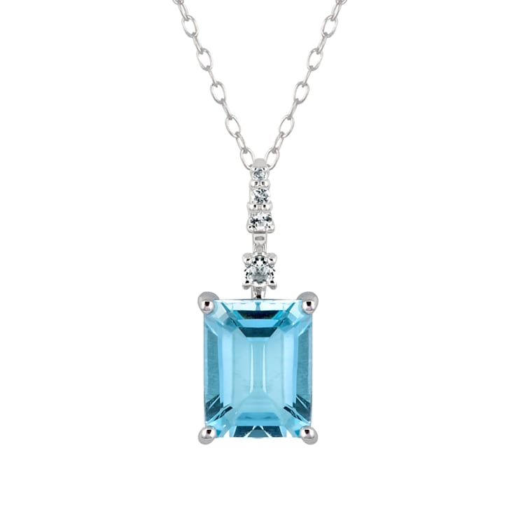 10k White Gold Genuine Emerald Cut Blue Topaz and White Topaz Pendant
With Chain