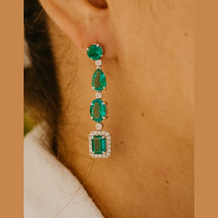7.70Cts Colombian Emerald, 0.64cw diamond, crafted in 18K White Gold Earrings.