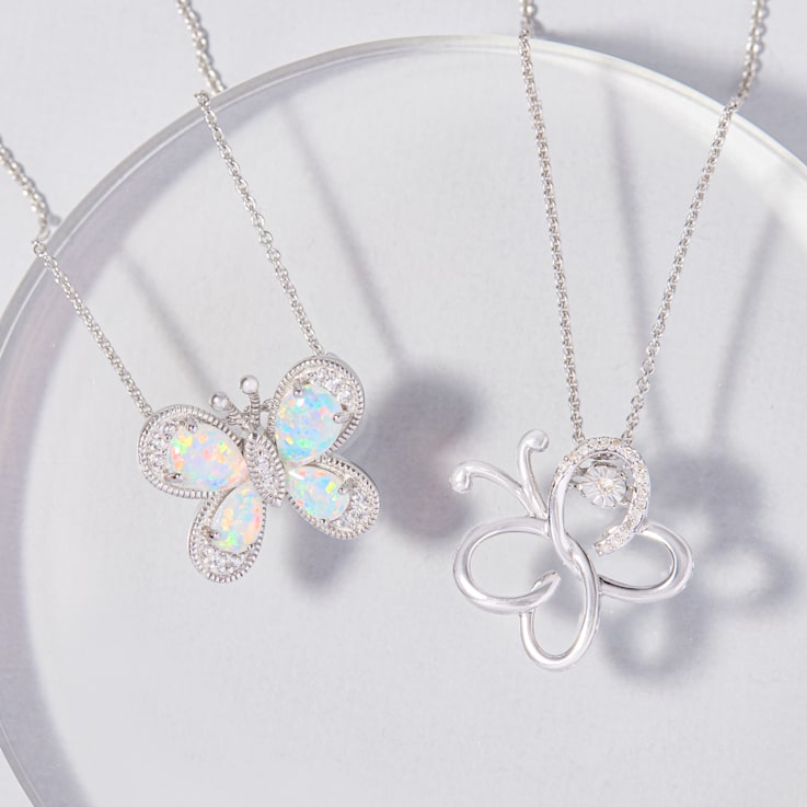 Jewelili Created White Opal and Created Sapphire Butterfly Sterling
Silver Pendant with Rolo Chain