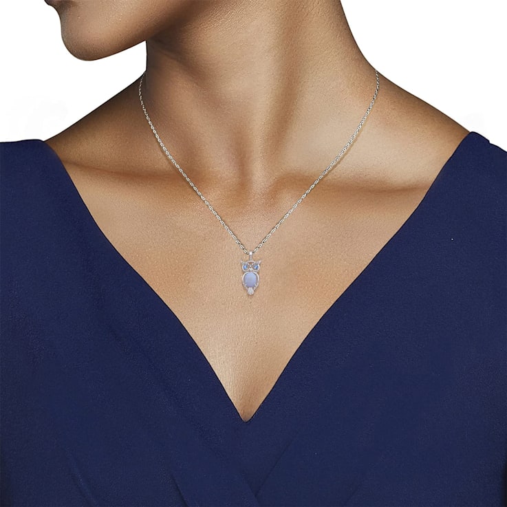 Jewelili Sterling Silver Created Opal, Swiss Blue Topaz and White
Diamond Owl Pendant