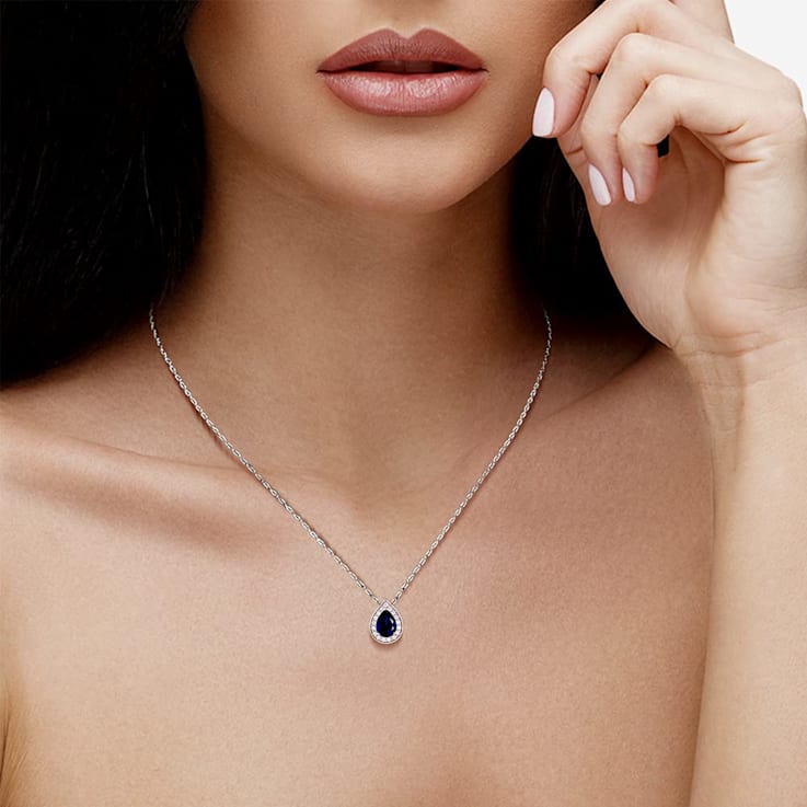 Jewelili Created Blue Sapphire and Created White Sapphire Sterling
Silver Pendant with Box Chain