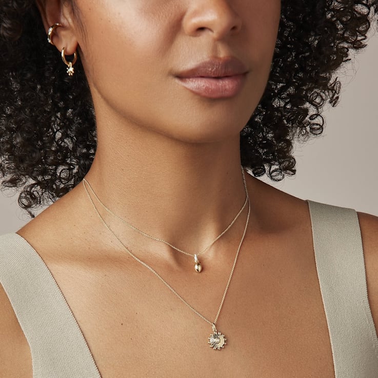 MFY x Anika Yellow Gold over Sterling Silver with 0.01 cttw Lab-Grown
Diamond Pendant