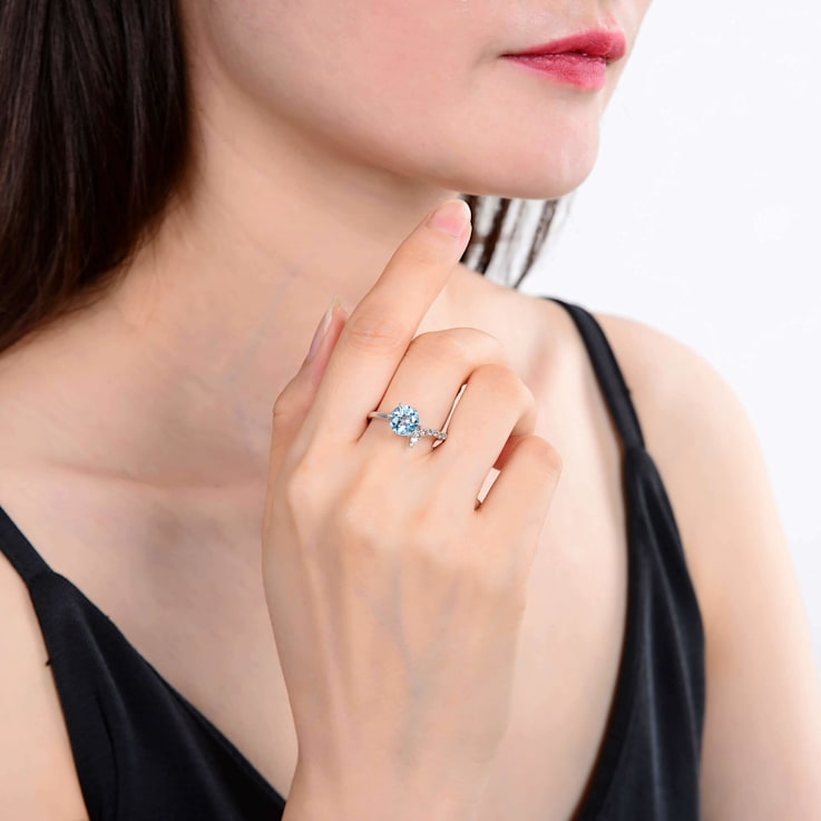 Sterling Silver Round Blue Topaz Ring Accented with White Topaz