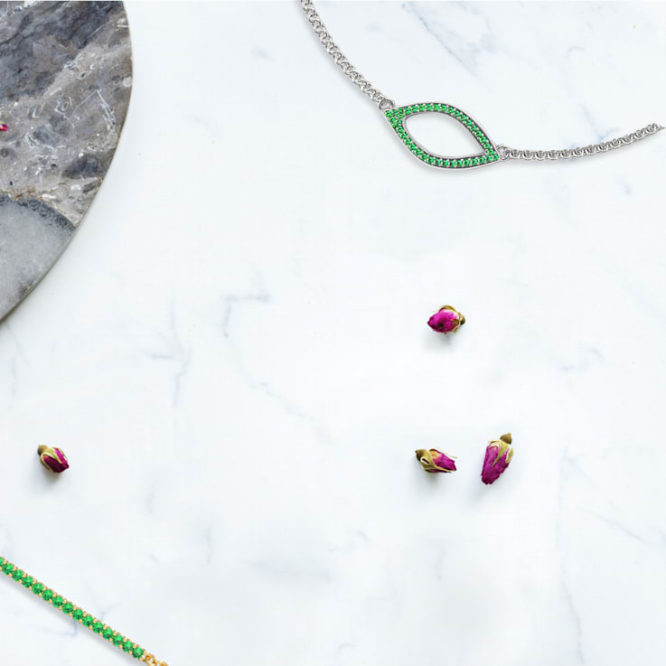 Rose Leaf Collection - 14ct White Gold setting Sterling Silver chain
Necklace - 38 Green Emeralds