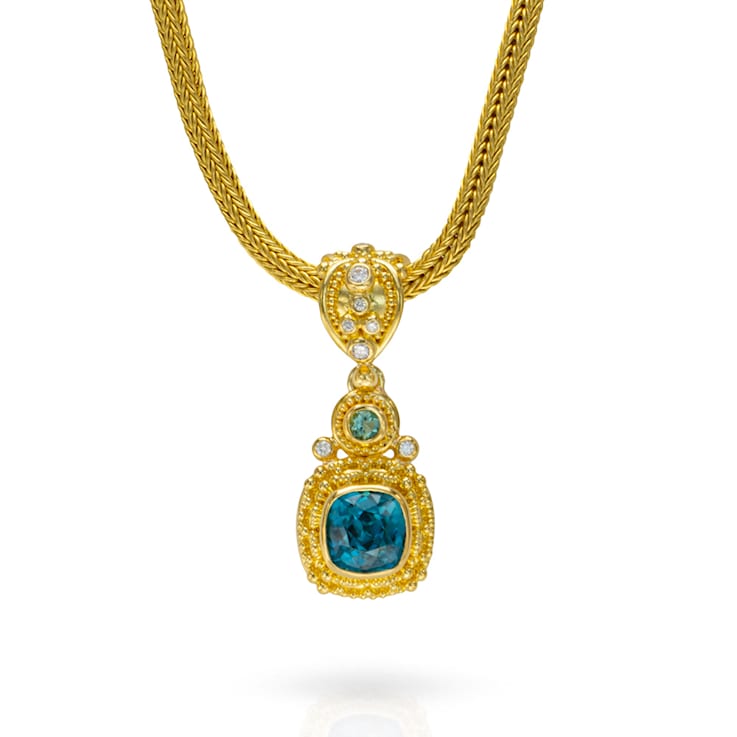 Classic Collection Pendant in 22kt & 18kt gold set with Blue Zircon,
Tourmalines and Diamonds