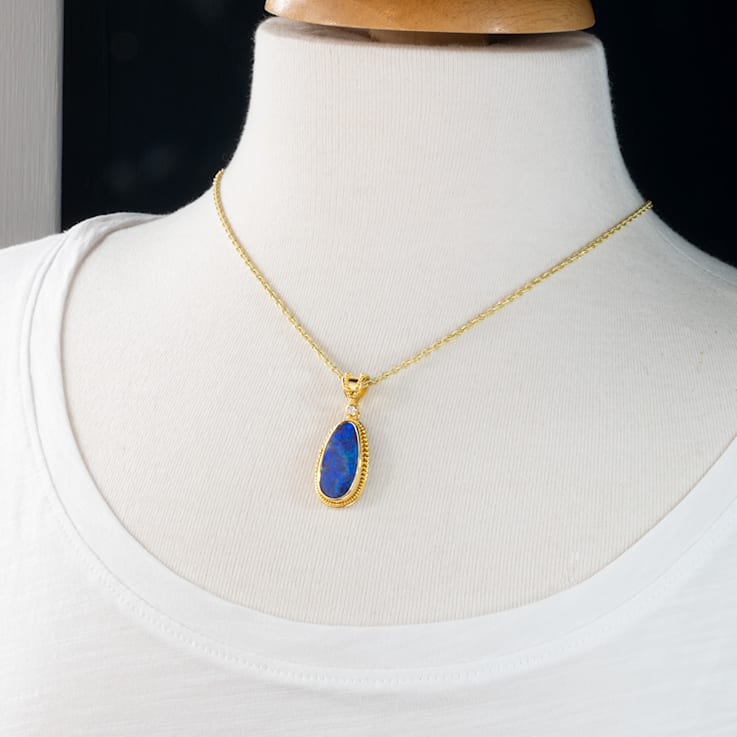 Classic Collection Pendant in 22kt & 18kt gold set with Boulder Opal
and Diamond
