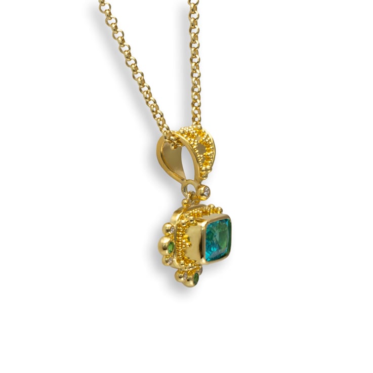 Classic Collection Pendant in 22kt & 18kt gold set with Apatite,
Garnets and Diamonds