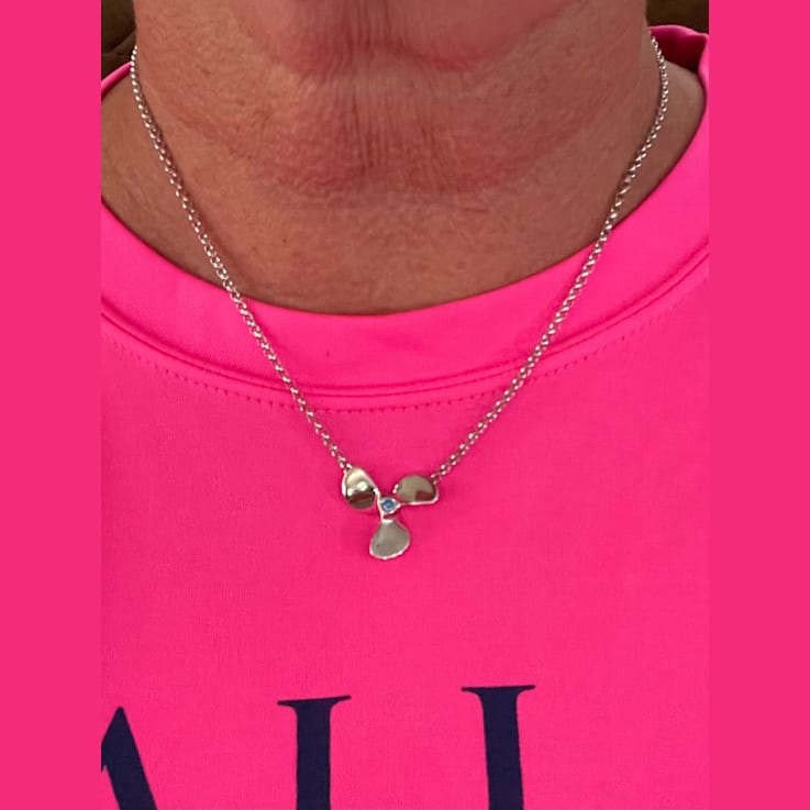 Sterling Silver Propeller Rolo Chain Necklace with Blue CZ Accent.