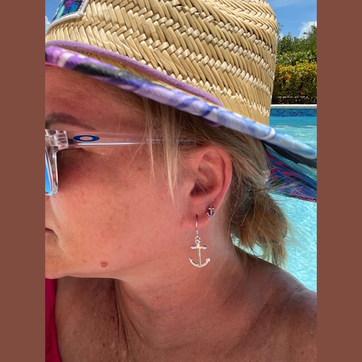 Sterling Silver Anchor Dangle Earrings with Blue CZ Accents.