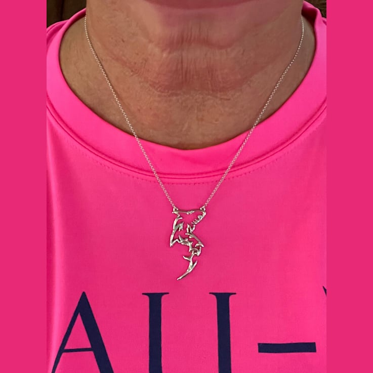 Sterling Silver Shark Silhouette Necklace with Rolo Chain and Blue CZ Accent.