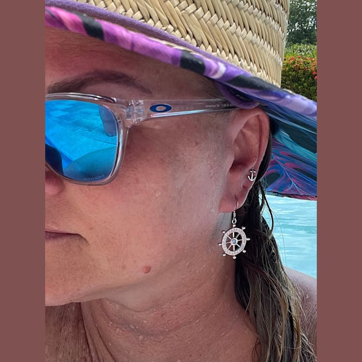 Sterling Silver Ship Wheel Dangle Earrings with White Crystal and Blue CZ.