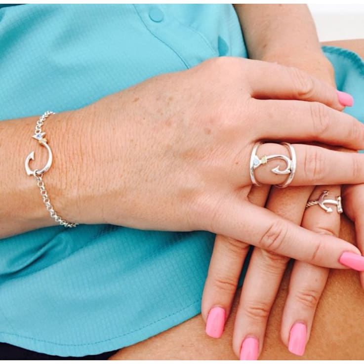 Sterling Silver Anchor Ring with Rope Design and Blue CZ Accent.