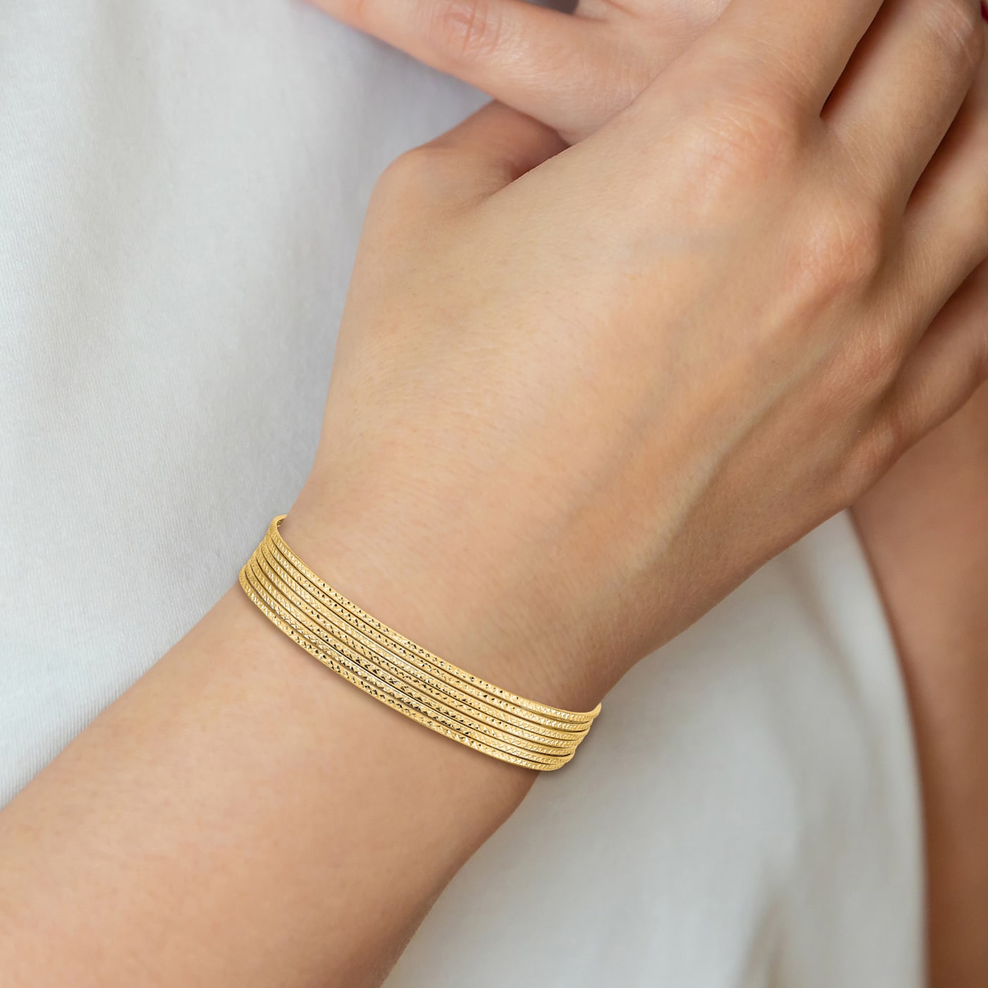 14k Yellow Gold Oversized Set of 7 Slip-on Textured Bangles