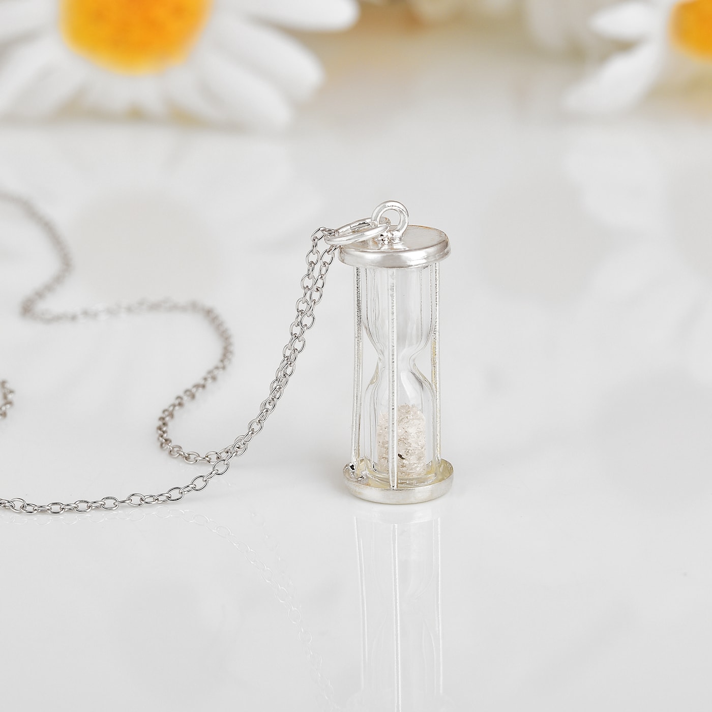 Hourglass charm sale