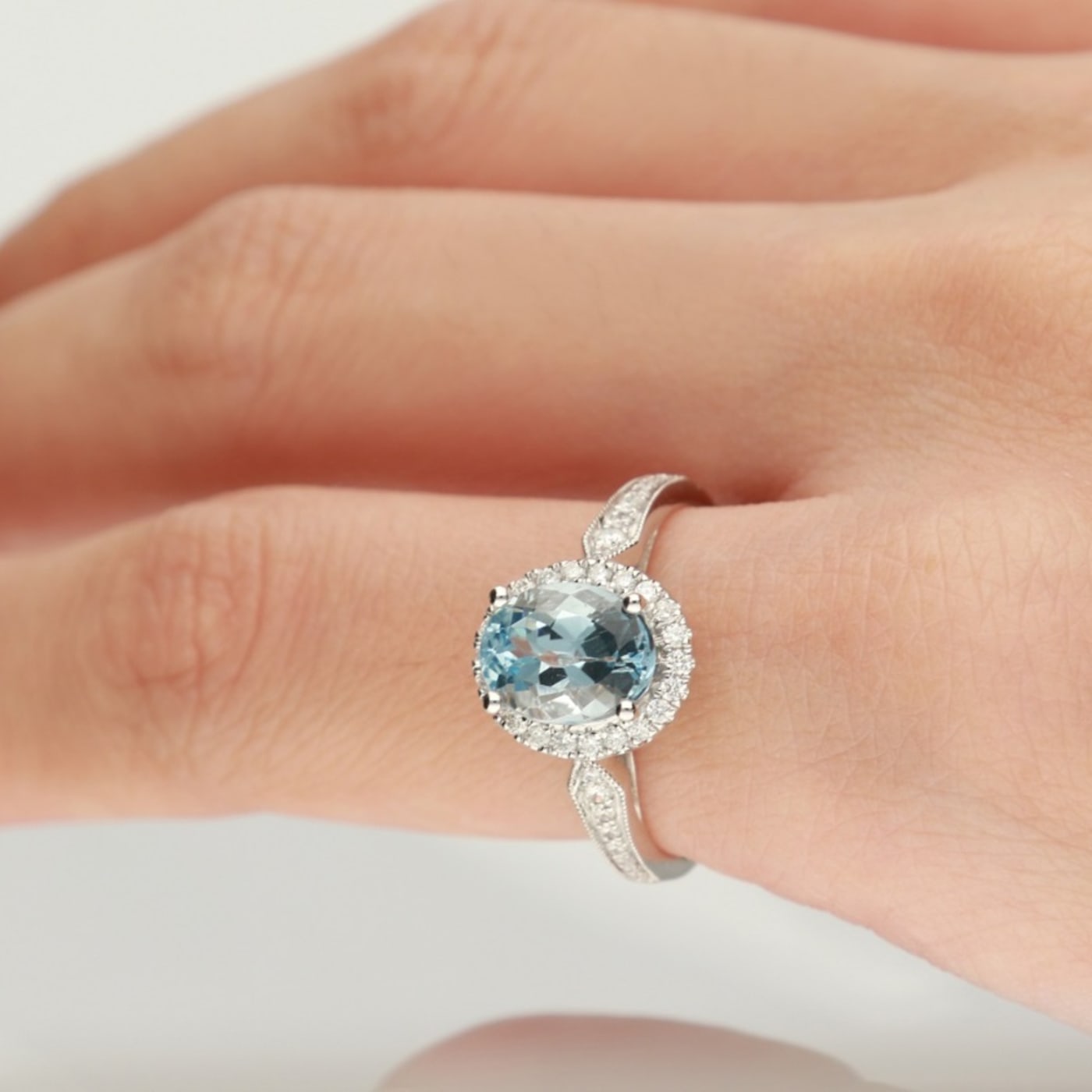 model wearing aquamarine ring 