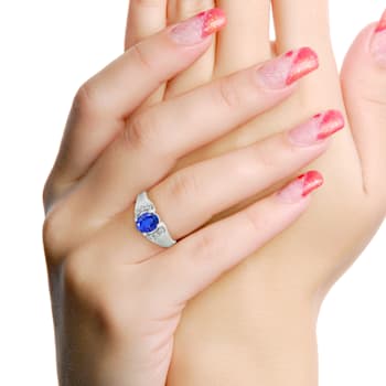 14K White Gold Oval Tanzanite and Diamond Ring, 1.50ctw